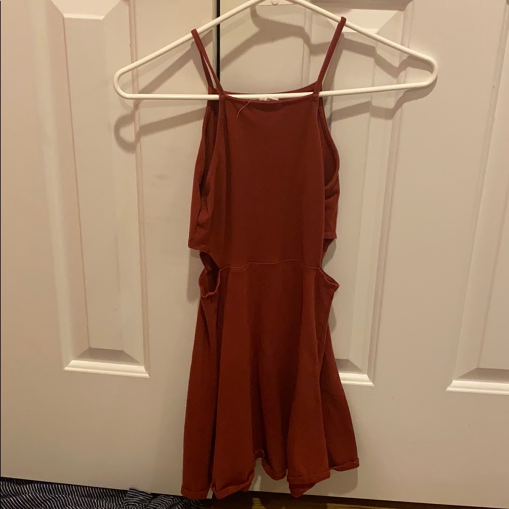 Dress with openings on the sides